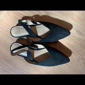 Black flats with back heel strap